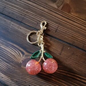 Cherry Keychain with Gold and Green Accents